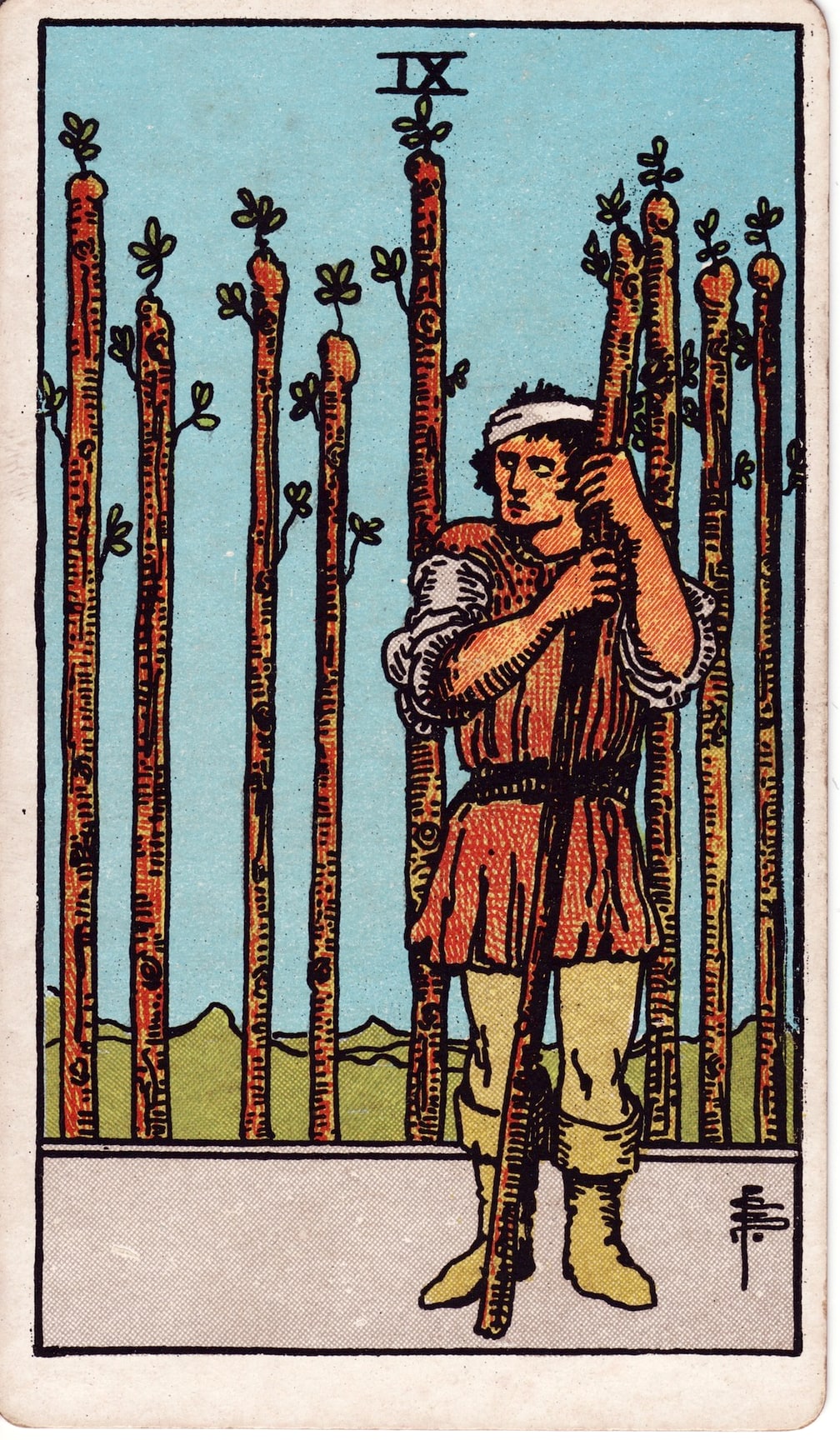Nine of Wands Tarot Card Meaning: Resilience, Perseverance, and Boundaries