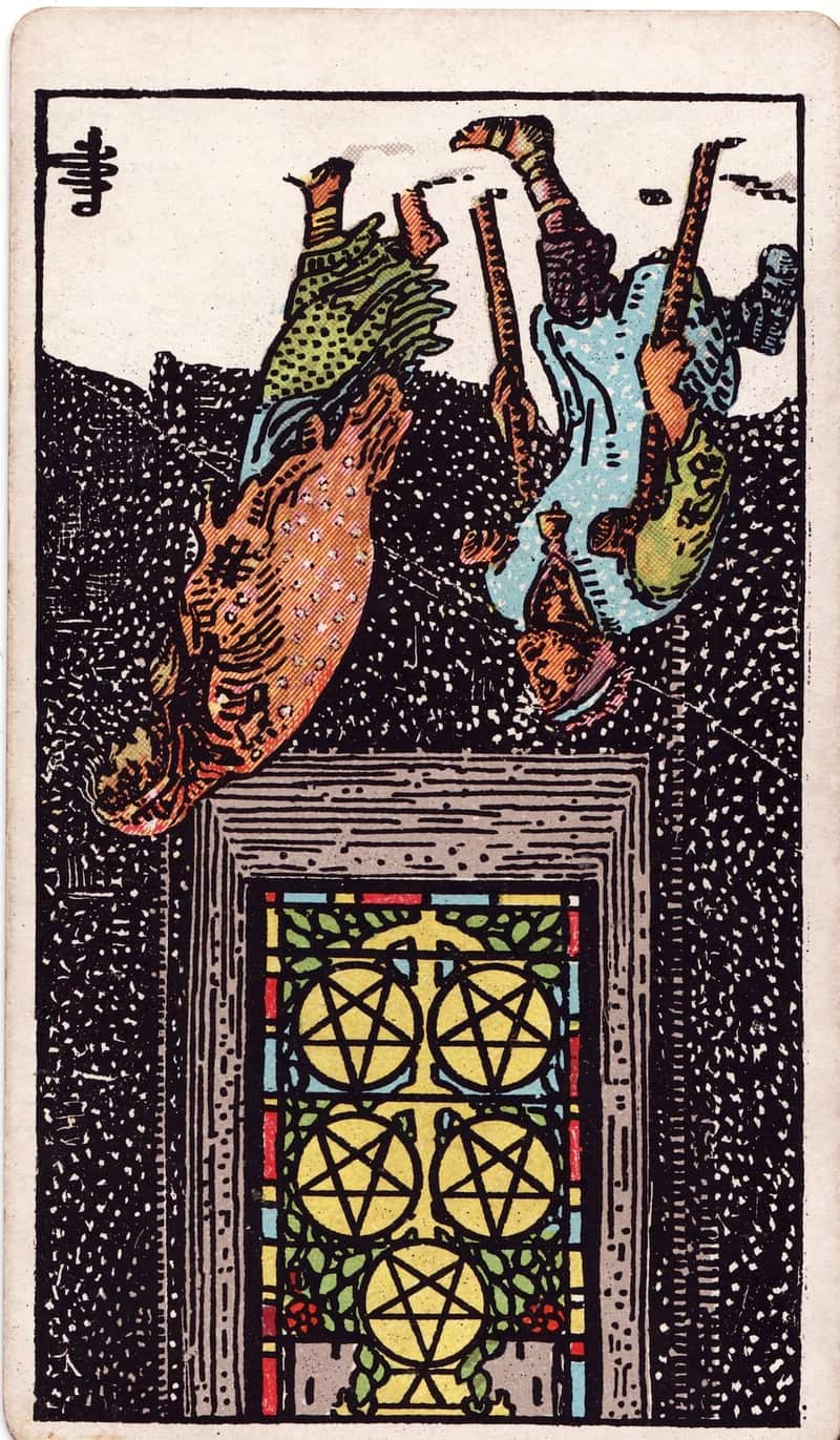 Five of Pentacles reversed tarot card