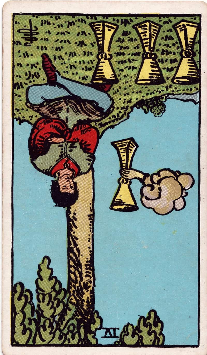 Four of Cups reversed tarot card