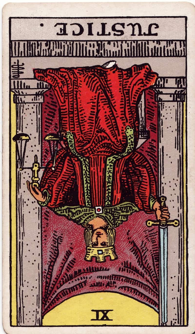 Justice reversed tarot card