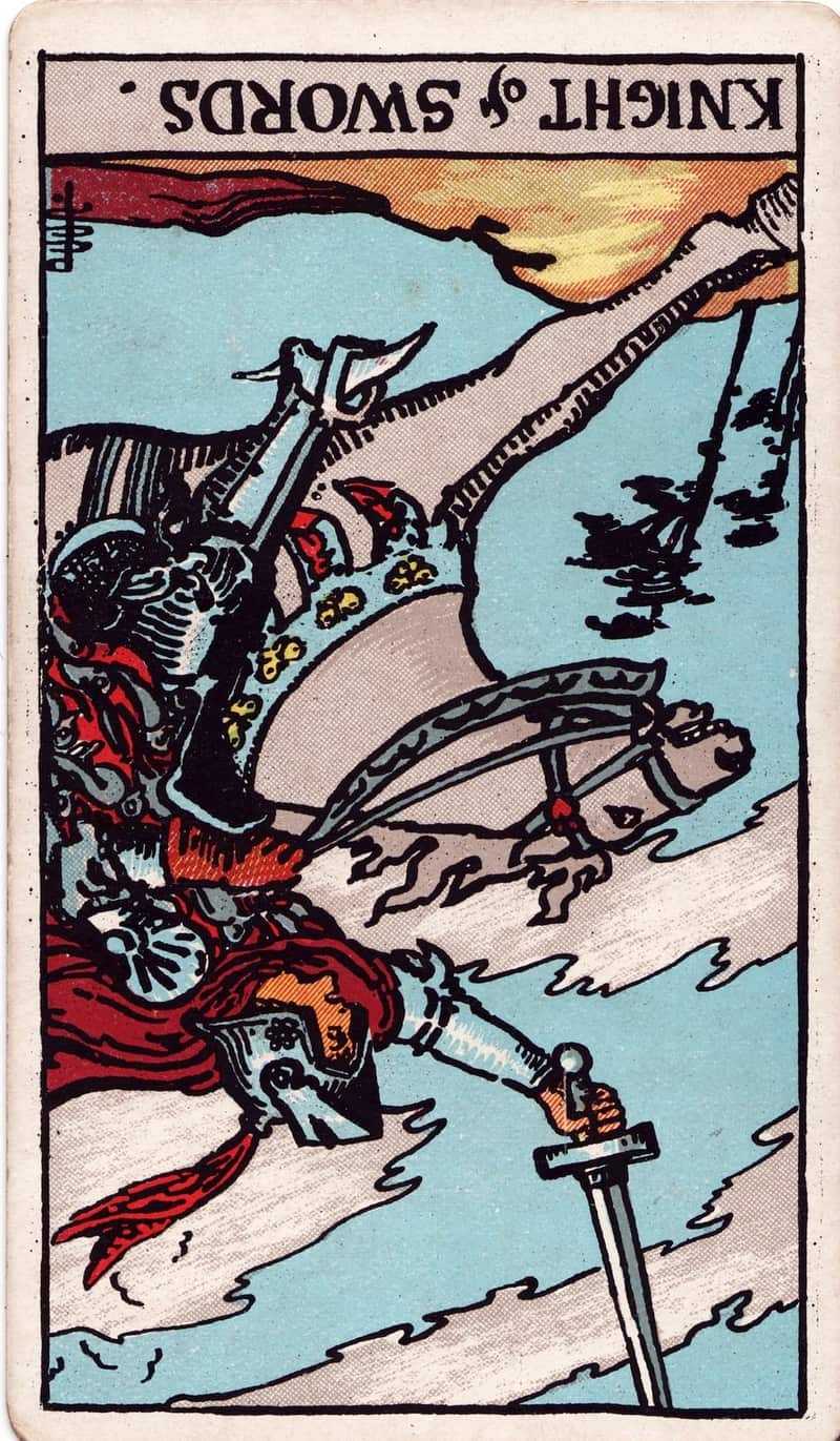 Knight of Swords reversed tarot card