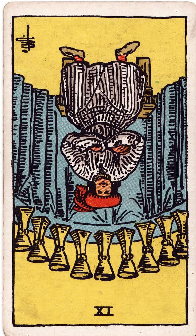 Nine of Cups reversed tarot card