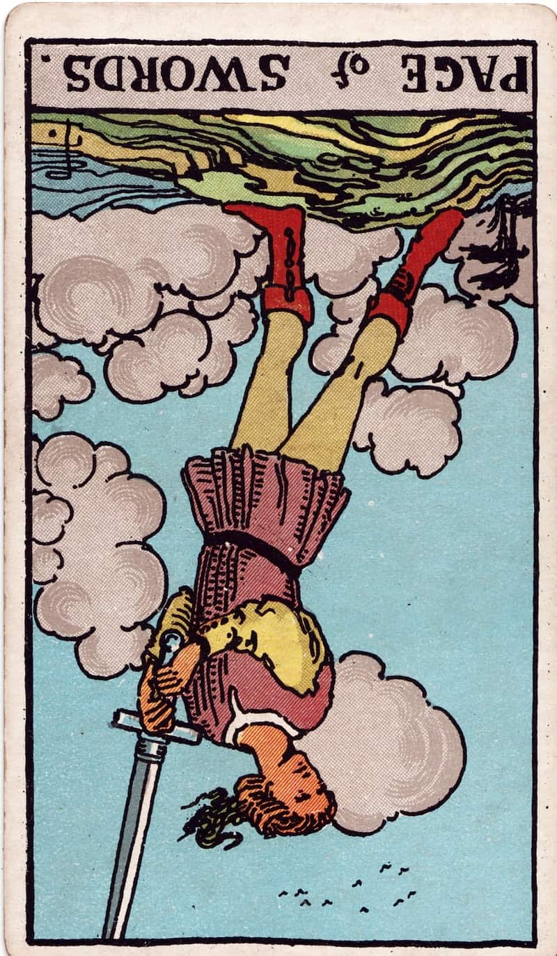 Page of Swords reversed tarot card