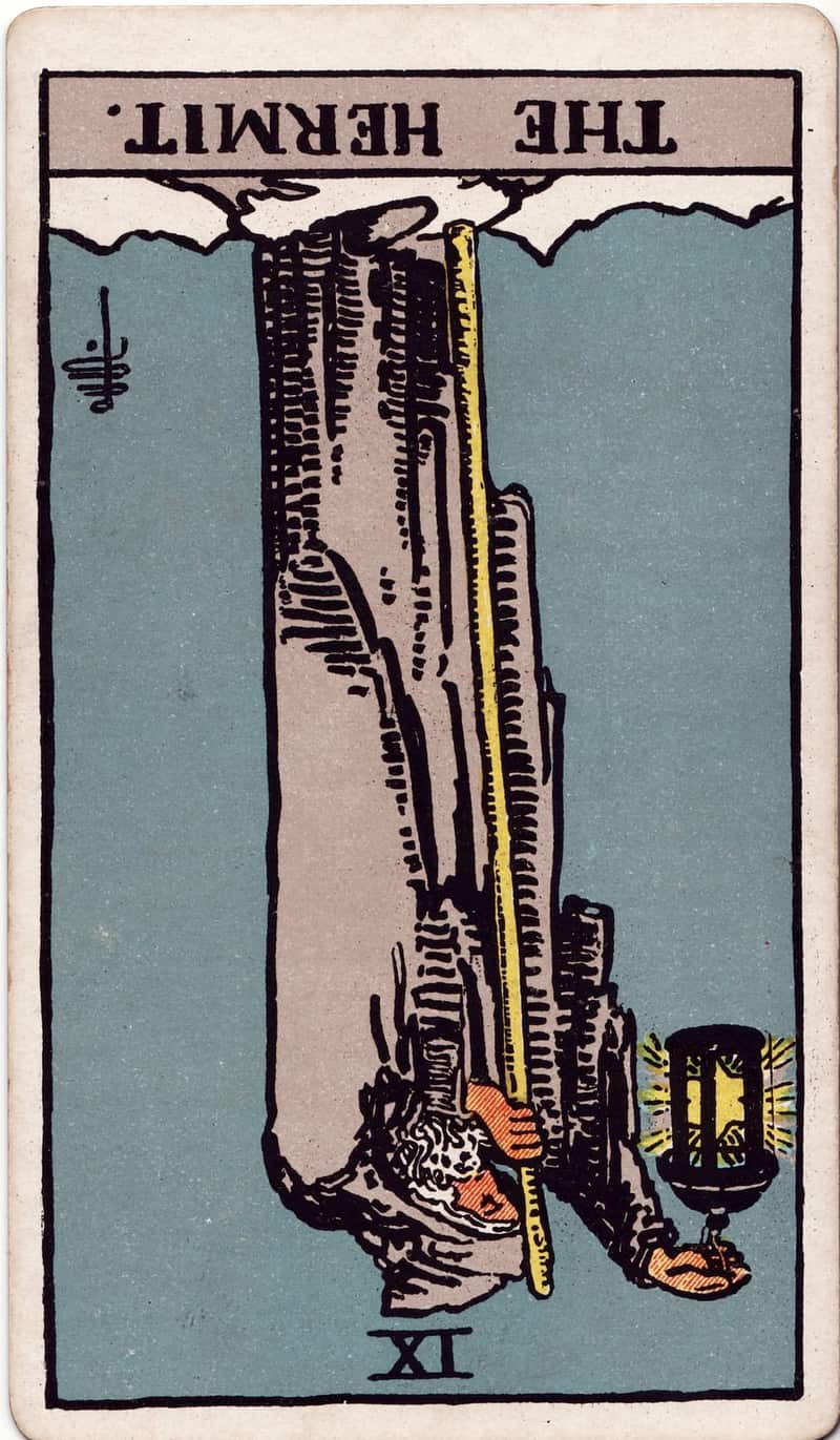 The Hermit reversed tarot card