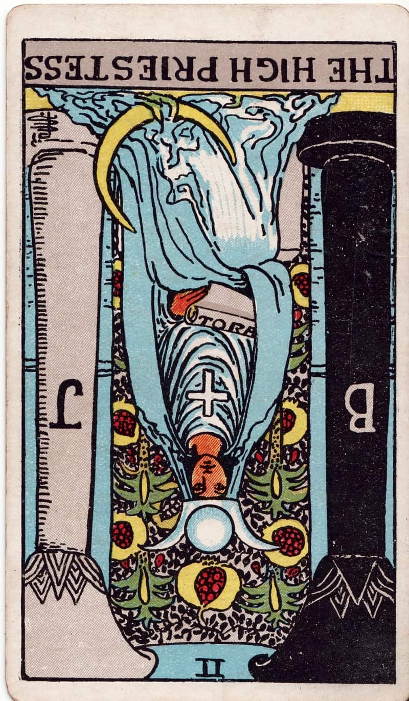 The High Priestess reversed tarot card