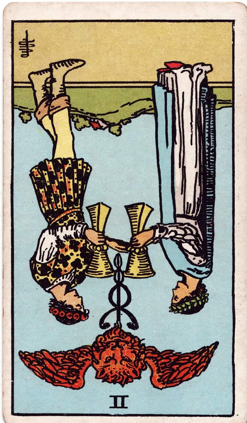 Two of Cups reversed tarot card