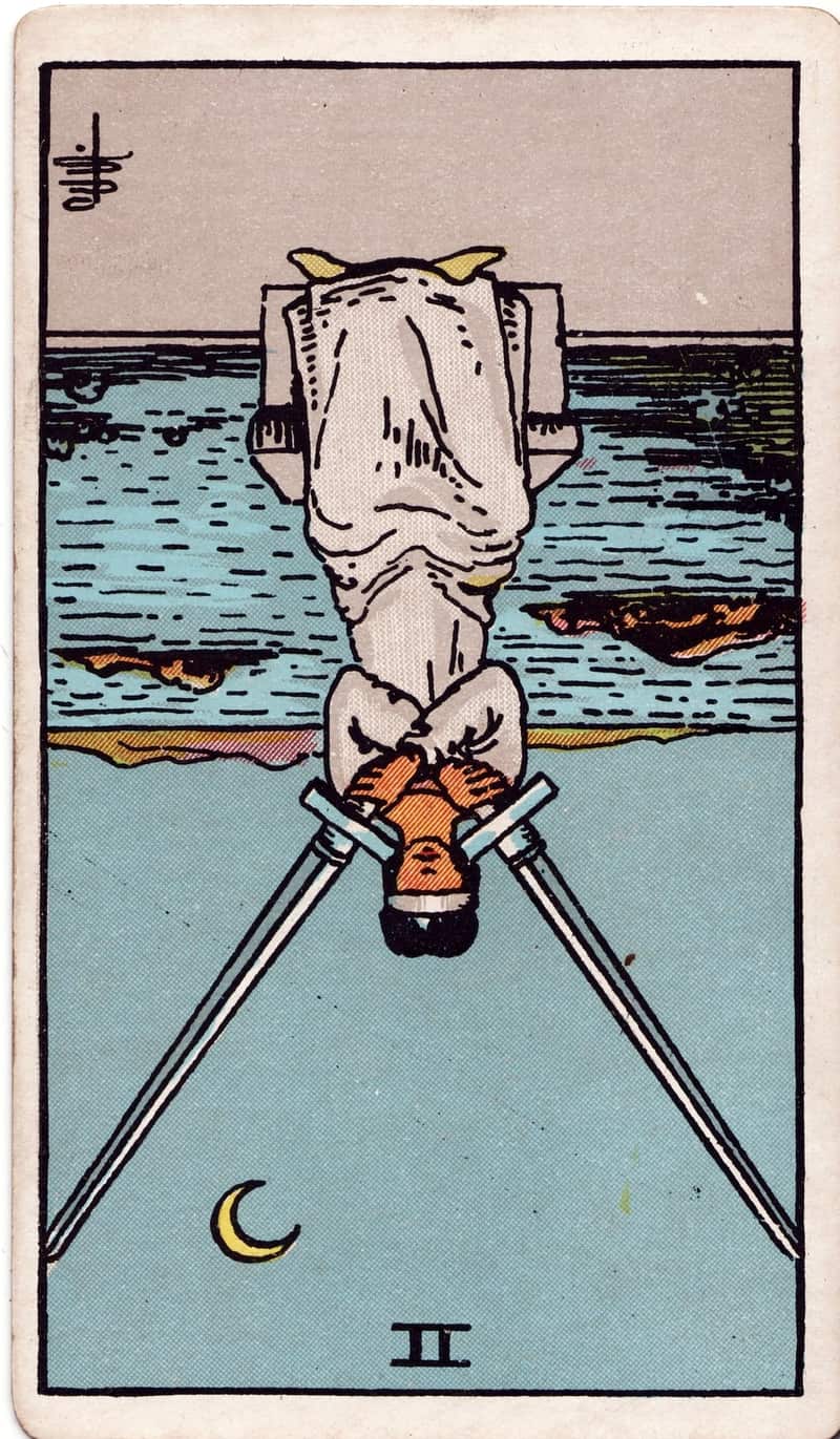 Two of Swords reversed tarot card